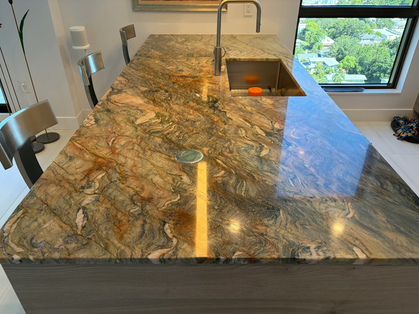 Polished quartzite kitchen island restored by Luis's Home Repairs