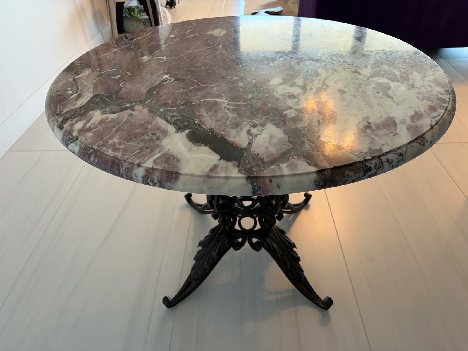 Round marble table top repaired and polished by Luis's Home Repairs