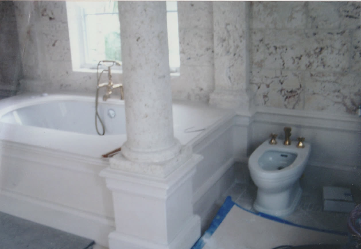 Marble tub deck and column base stonework by Luis's Home Repairs